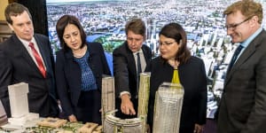 (From left) former MP Anthony Lynham,Premier Annastacia Palaszczuk,then-chief executive of Echo Entertainment (Star) Matthew Bekier,MP Grace Grace and Echo Entertainment Queensland director Geoff Hogg (now Star acting-chief executive) looking at a model of the Queen’s Wharf Brisbane development in 2015.