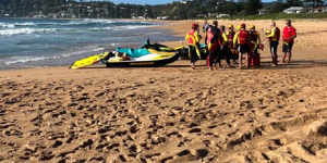 Divers are in the water and lifesavers are on jetskis in the search for a 15-year-old who was swept off rocks on Tuesday afternoon.