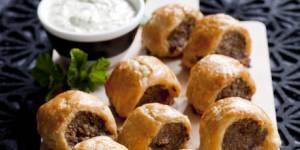 Moroccan lamb sausage rolls with yoghurt dipping sauce.