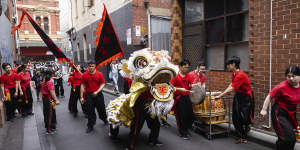 The Chinese Masonic Society Lion Dance Team perform a practice parade in Chinatown,January 2023.