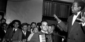 Vocalist Nellie Small and accordionist Gus Merzi perform at the Hotel Castlereagh on August 20,1954. Of West Indian heritage but Sydney-born,Small was described in the papers of the time as a"male impersonator".