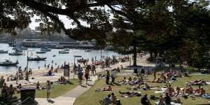 People relaxing in the sun in Manly,in Sydney’s northern beaches,on the weekend before restrictions are eased.