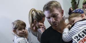David Warner and his family arrive back in Sydney after the Cape Town ball-tampering affair in 2018.