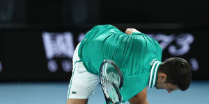 World No.1 Novak Djokovic smashes his racquet on the court during this year’s Australian Open.
