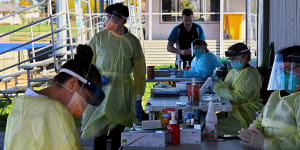 Health workers at the COVID-19 Dubbo West walk-in clinic in August.