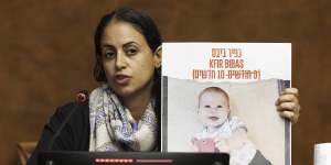 Ofri Bibas Levy,sister of Yarden Bibas,held hostage in Gaza with his wife,Shiri,and two children,Kfir and Ariel,speaks to the media on November 14.