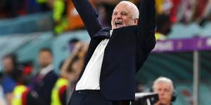 Glorious moment:Socceroos coach Graham Arnold celebrates at the final whistle.