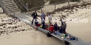 Emergency services were treating the man’s injuries on Saturday morning.