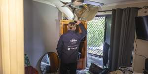 NRMA assessing a damaged home in Nerang,Queensland. 