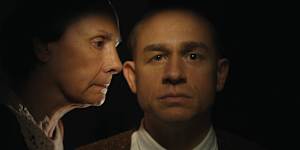 Laurie Metcalf as Augusta Gein,Charlie Hunnam as Ed Gein in Monster:The Ed Gein Story.