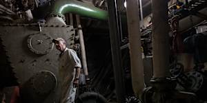 Steam engineer Graeme Curran in the South Steyne’s engine room.