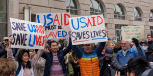 Demonstrators outside the US Agency for International Development (USAID) headquarters in Washington.