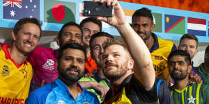 Team captains pose for a selfie before the Men’s T20 World Cup.
