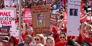 Teachers strike outside NSW Parliament in May. They will strike again next week.