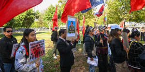 Protesters from Mynamar and Cambodia outside the ASEAN summit in Melbourne on Monday.