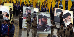 The funeral march of assassinated Hezbollah leader Imad Mughniyah. His image is carried alongside those of Shiite clerics Ayatollah Ruhollah Khomeini,Musa Sadr and Ragheb Harb.