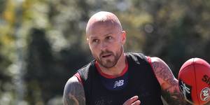 Nathan Jones makes a statement at training on Friday.