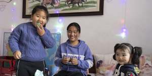 “When I grow up,I would like to have two kids,one son and one daughter,” 14-year-old Yueying (centre) says. “I also hope to develop my career because my own career can pave the way to the success of my children.”