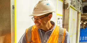 Allan inspects the work at Parkville Station.