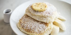 Ricotta hotcakes with banana and honeycomb butter.