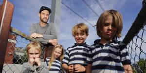 Chris Collier (rear) with his children - Louis,4,and Lilith,8 - and Gideon,8,and Rupert,6,Binstead in West Melbourne on Thursday.