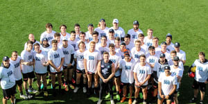 The Carlton playing group wearning Marc Murphy 300-game t-shirts.