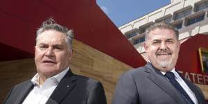 City of Greater Dandenong chief executive John Bennie and Mayor Jim Memeti stand in front of the municipal building,completed in 2014.
