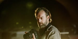 Hugo Weaving as a war photographer in Hearts and Bones. 
