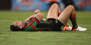 Sam Burgess feels the injured shoulder that forced him out of the game. 