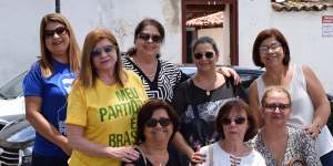 Backing Bolsonaro:Lourdes (yellow T-shirt),Fatima (second from left,back row) and Clea (left,front row).
