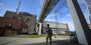 A Russian serviceman guards in an area of the Zaporizhzhia Nuclear Power Station in territory under Russian military control.