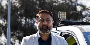 Wyndham city councillor Preet Singh,with one of the private security patrol cars that will operate within Truganina. 