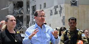 Israeli President Isaac Herzog (centre) addresses media in Beersheba,Israel in June 2025.