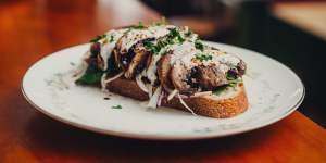 Sauteed five-spiced mushrooms with mirin on sourdough spinach and silken tofu cream.