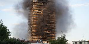 Unidentified residents said the panels on the facade were supposed to have been fire-resistant.