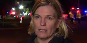 A screenshot of Nicole Kirk,the mother of a grade 5 girl who was on the bus when it crashed,speaking to a Nine News reporter at the scene.