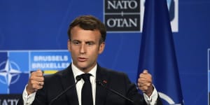 French President Emmanuel Macron speaks at the end of a NATO summit in Brussels.