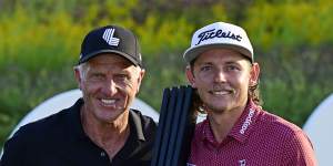Cameron Smith with LIV Golf chief executive Greg Norman after his win in Chicago.