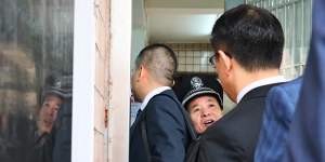 Lawyers for the accused were forced to wait for the small security door to the court and detention complex to be opened.