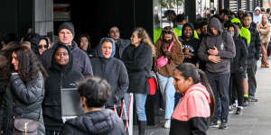 Applicants queued up for at least three hours in Melbourne to check on the status of their passports.