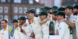 The Australians celebrate retaining the Ashes.