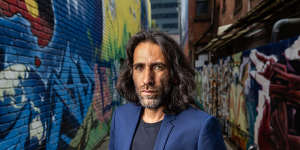 Behrouz Boochani in Melbourne on Wednesday calling for a royal commission into immigraiton detention.