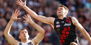 Collingwood’s Darcy Cameron and Essendon’s Jordan Ridley in this year’s Anzac Day clash.