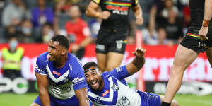 Tevita Pangai jnr sticks his tongue out after scoring,but it was one of the few highlights for the Dogs.