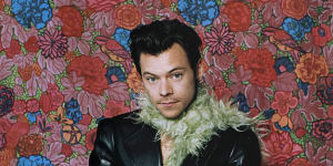 Harry Styles poses for the 2021 Grammy Awards.