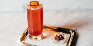 It's all in the details:the signature Americano cocktail with a round of mandarin rind.