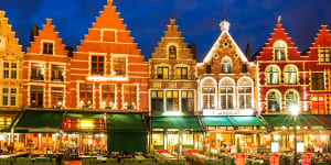 Night image of north side of Market Square,with enchanting street cafes,meeting place of the Bruge.