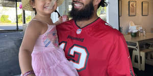 Payne Haas with his daughter Lalita.