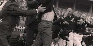 Carlton coach Ron Barassi jumps for joy after the comeback victory over Collingwood in the fabled 1970 VFL grand final. 