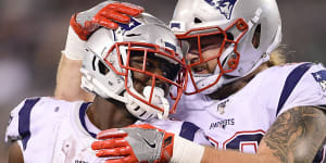 Michel rushes for three touchdowns as Patriots rout Jets